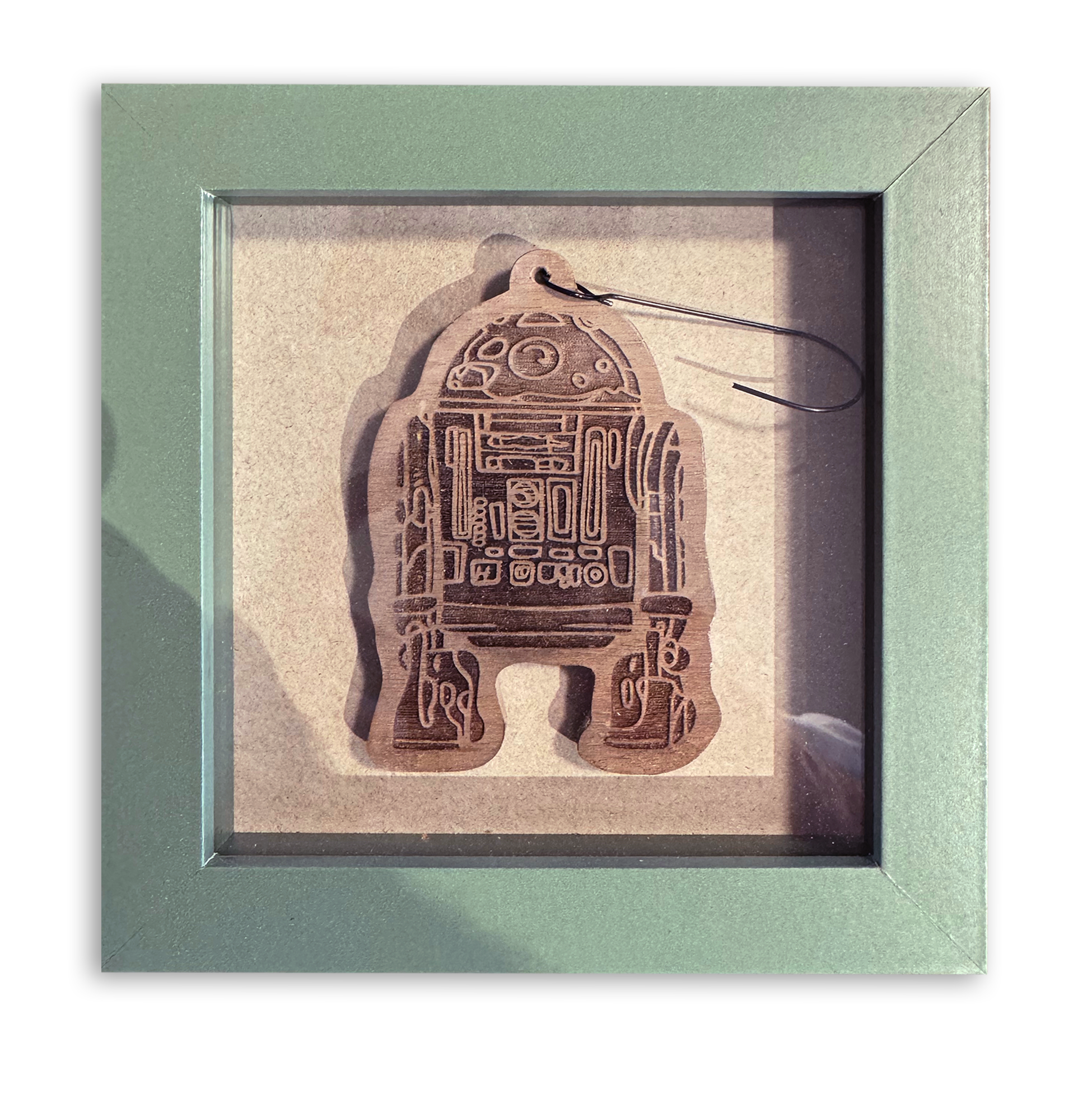 “R2-D2" ETCHED WOODEN ORNAMENT (Framed in Green)